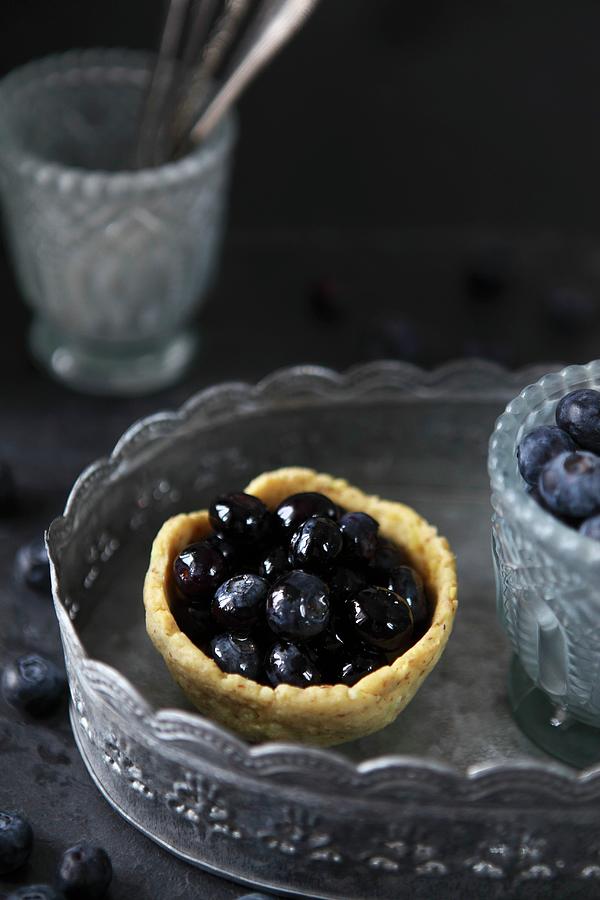 Pudding Tartlet With Blueberries On A Pewter Tray Photograph by Sabrina Sue Daniels