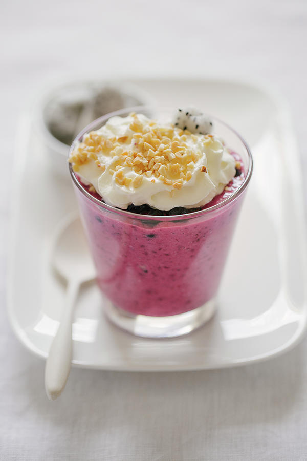 Pudding With Wild Berries, Whipped Cream, Nuts And Dragon Fruit Photograph by Valeria Aksakova