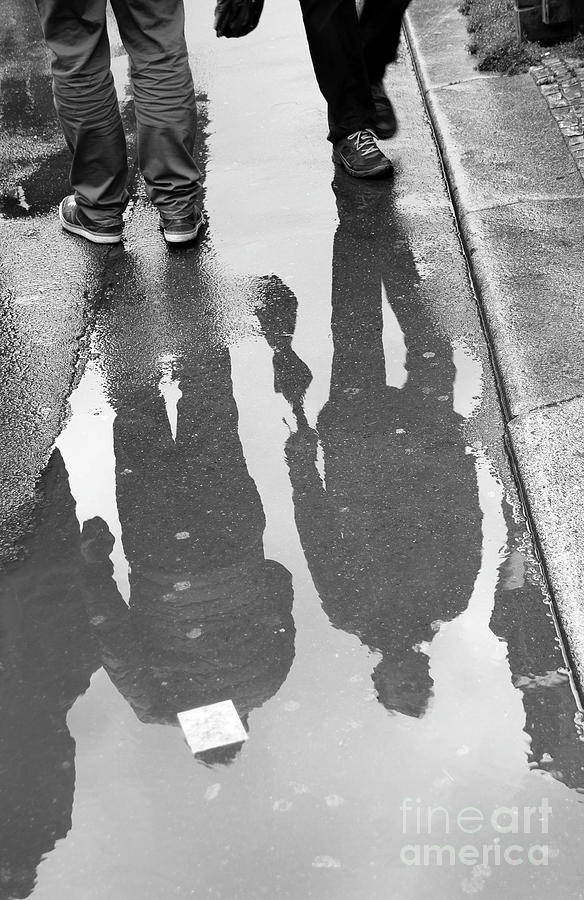 Puddles and people Photograph by Bridget Mejer - Pixels