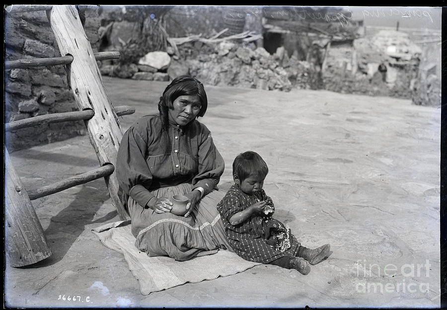 Pueblo Indian And Her Child Photograph by Bettmann