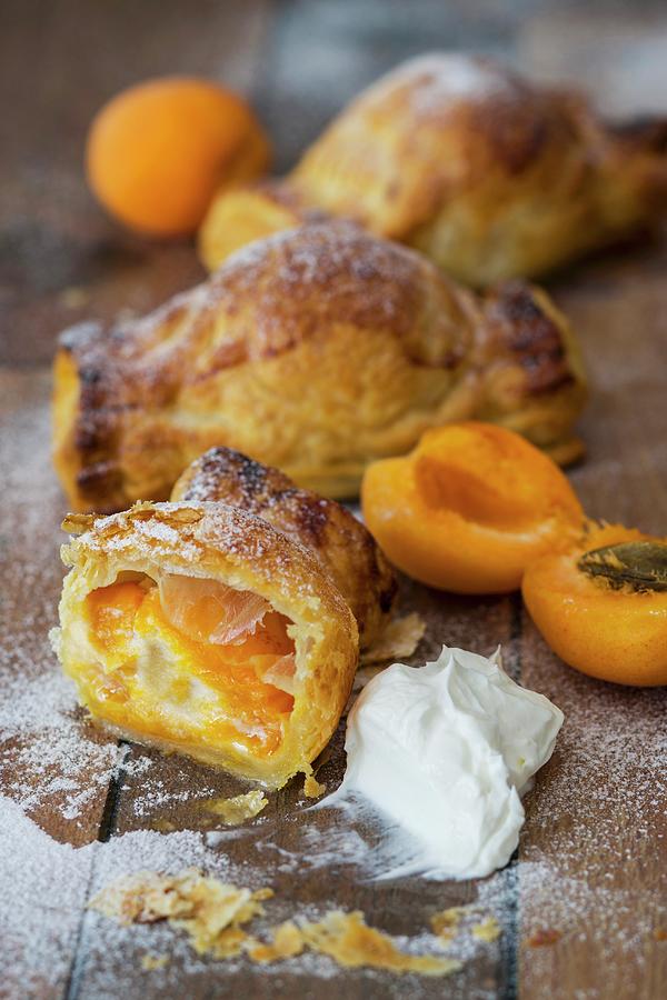 Puff Pastries Filled With Apricots And Goats Cheese Photograph by Jan Wischnewski