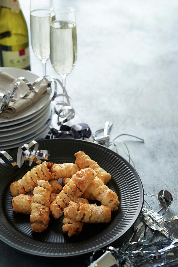 Puff Pastry Rolls With Prawns For New Years Eve Photograph by Martin Dyrlv