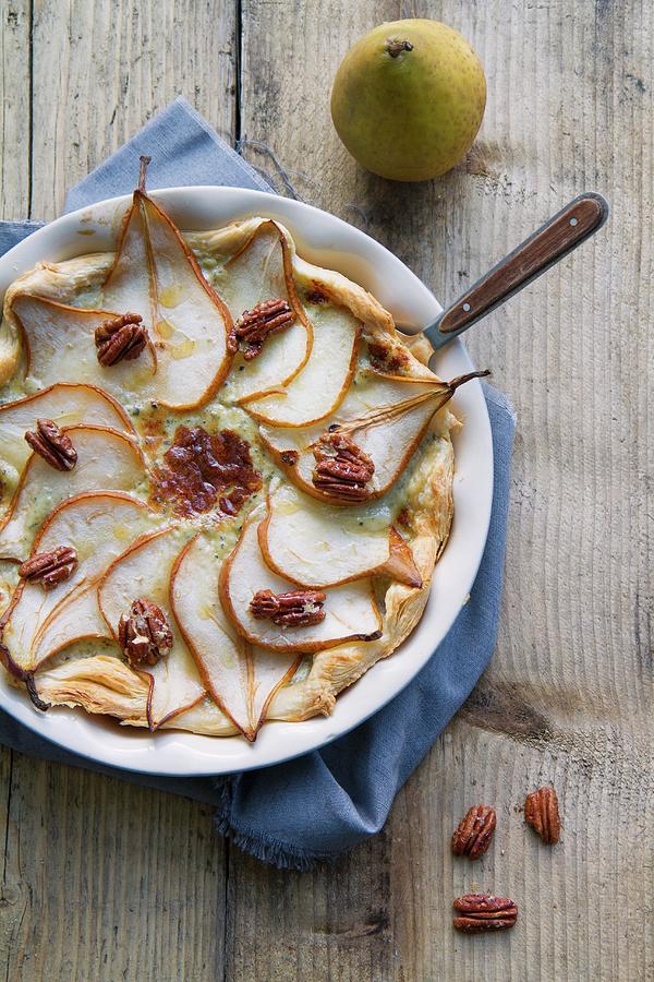 Puff Pastry Tart With Pears, Blue Cheese And Pecan Nuts Photograph by Anne Faber