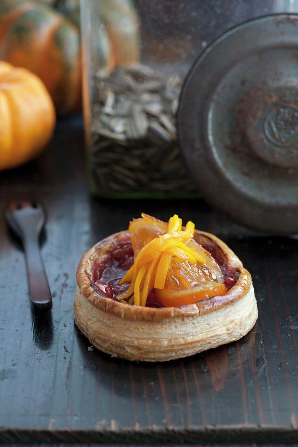 Puff Pastry With A Aronia Jam And Candied Orange Photograph by Martina Schindler