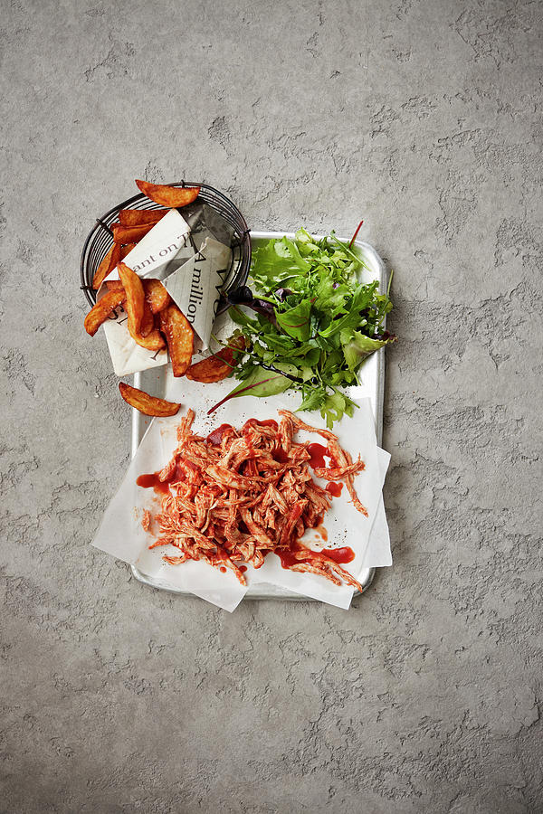 Pulled Chicken With Potato Wedges Photograph by Rafael Pranschke