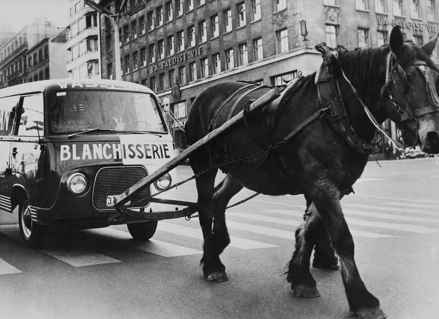 Pulling A Van With A Horse In Bruxelles Photograph by Keystone-france