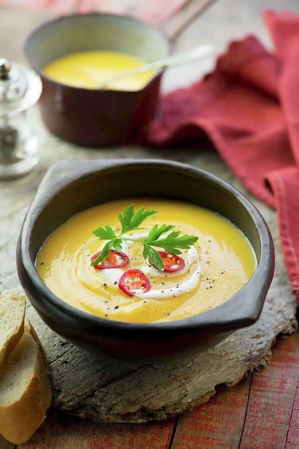 Pumpkin And Parsnip Soup With Chilli Rings Photograph by Jonathan Short