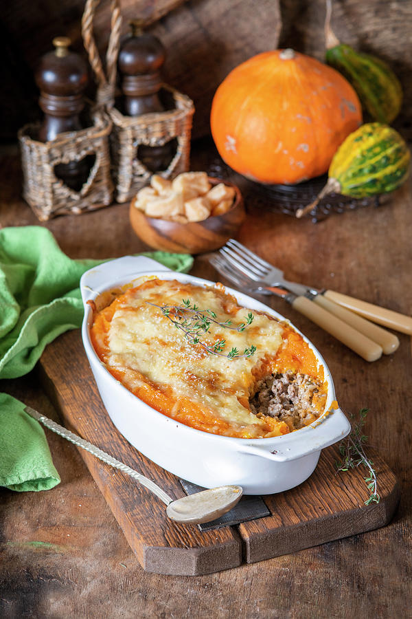 Pumpkin Bakle With Meat And Cheese Photograph by Irina Meliukh