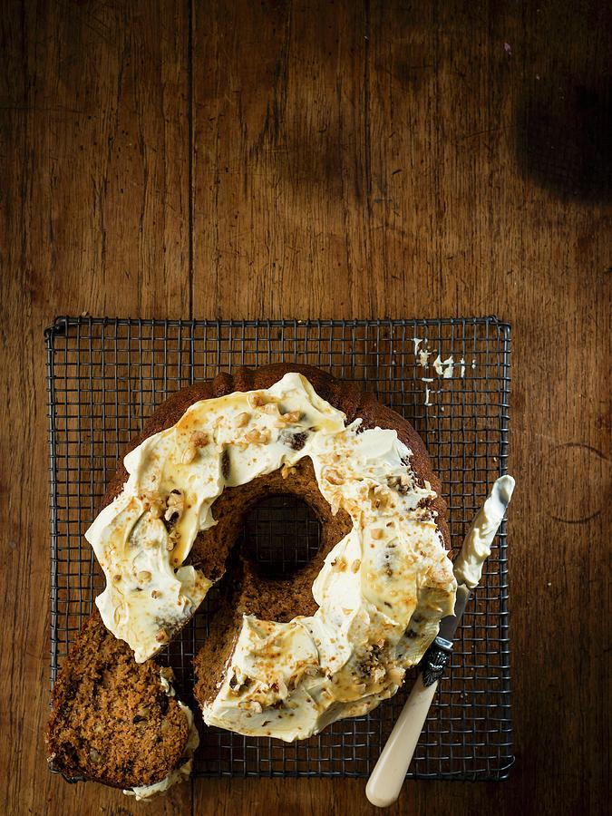 Pumpkin Cake With Walnuts, Dates And Maple Syrup And Cream Cheese Frosting Photograph by Great Stock!
