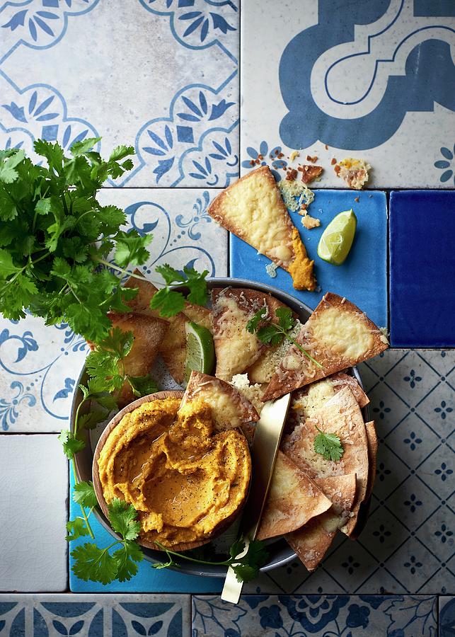 Pumpkin, Lime, And Chilli Houmous With Cheesy Tortilla Chips Photograph by Great Stock!