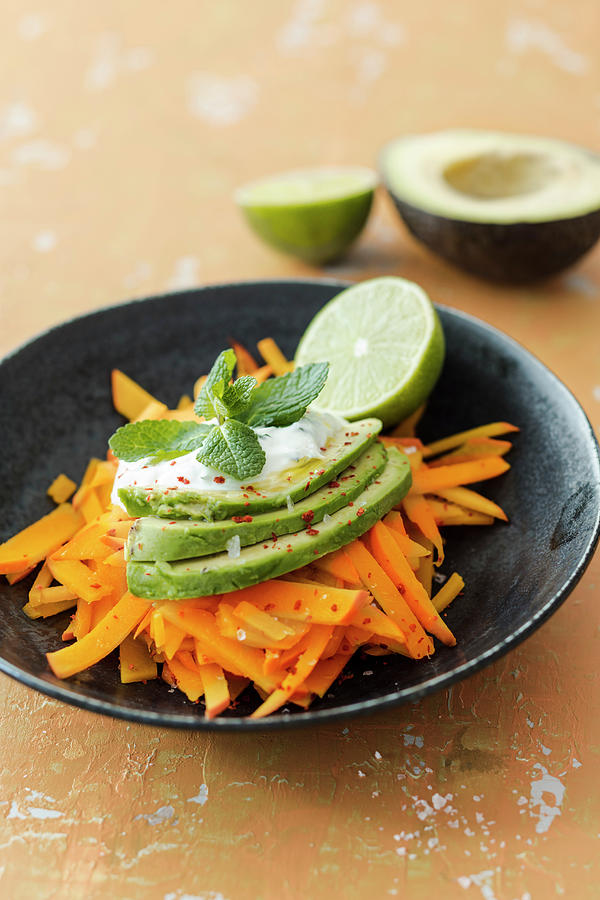 Pumpkin Noodles With Avocado, Limes And Mint Yoghurt Photograph by Jan Wischnewski