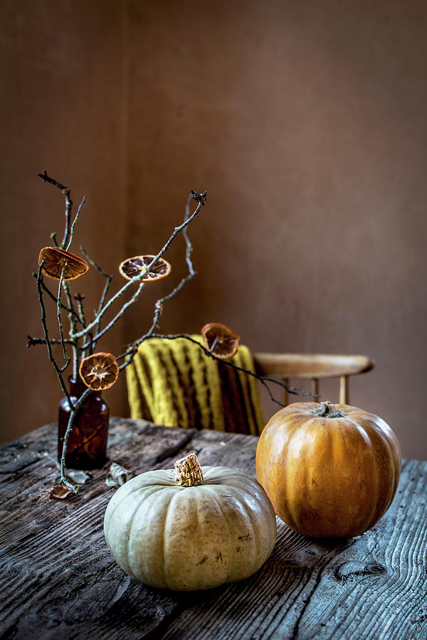 Pumpkin On The Autumn Table Photograph by Olimpia Davies