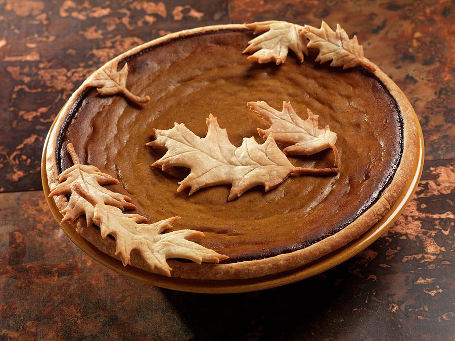 Pumpkin Pie Decorated With Shortcrust Pastry Leaves Photograph by Paul Poplis