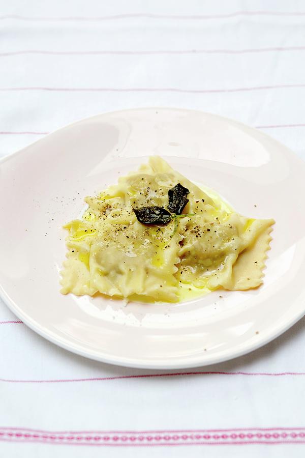 Pumpkin Ravioli With Butter And Parmesan Cheese Photograph by Milo Brown