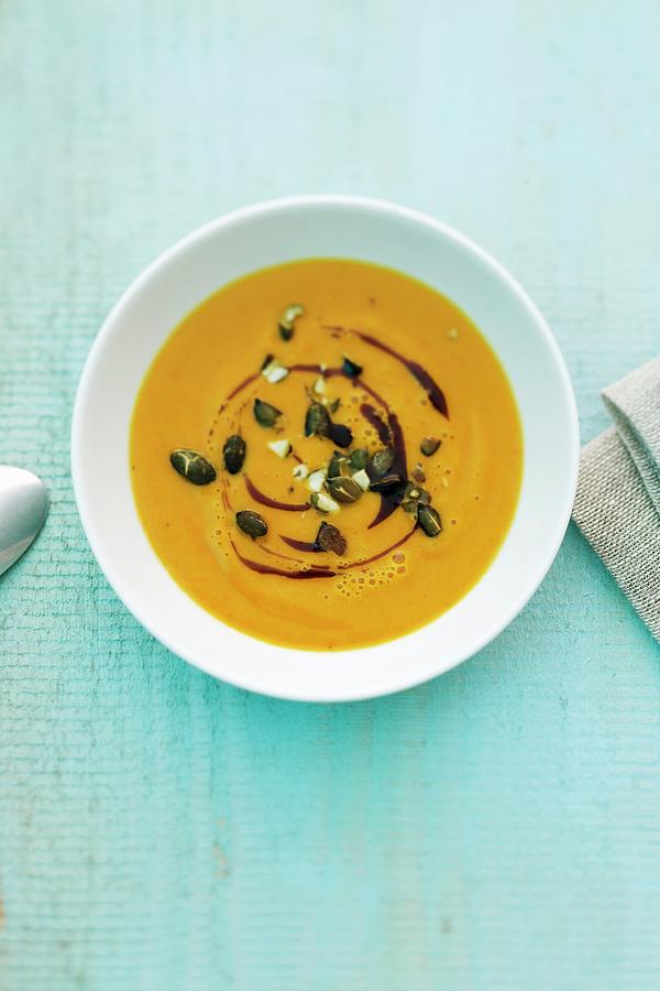 Pumpkin Soup With Madras Curry Photograph by Michael Wissing