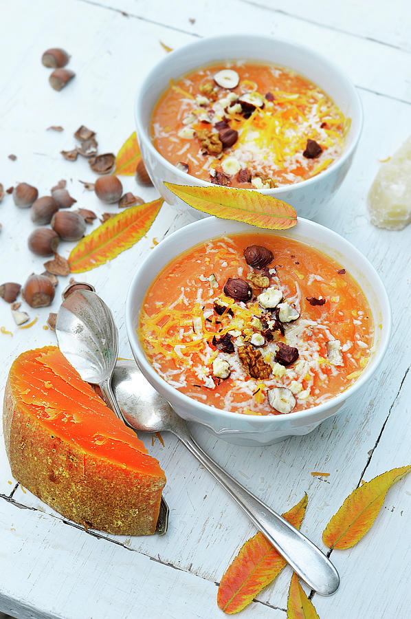 Pumpkin Soup With Nutmeg,dried Fruit,parmesan And Matured Mimolette Photograph by Keroudan