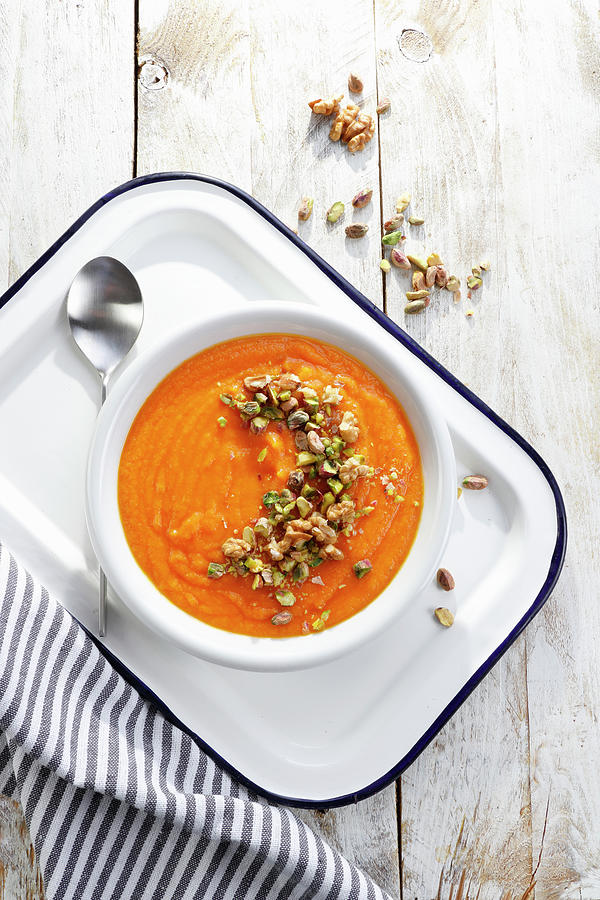 Pumpkin Soup With Pistachio And Nutty Topping Photograph by Wawrzyniak.asia