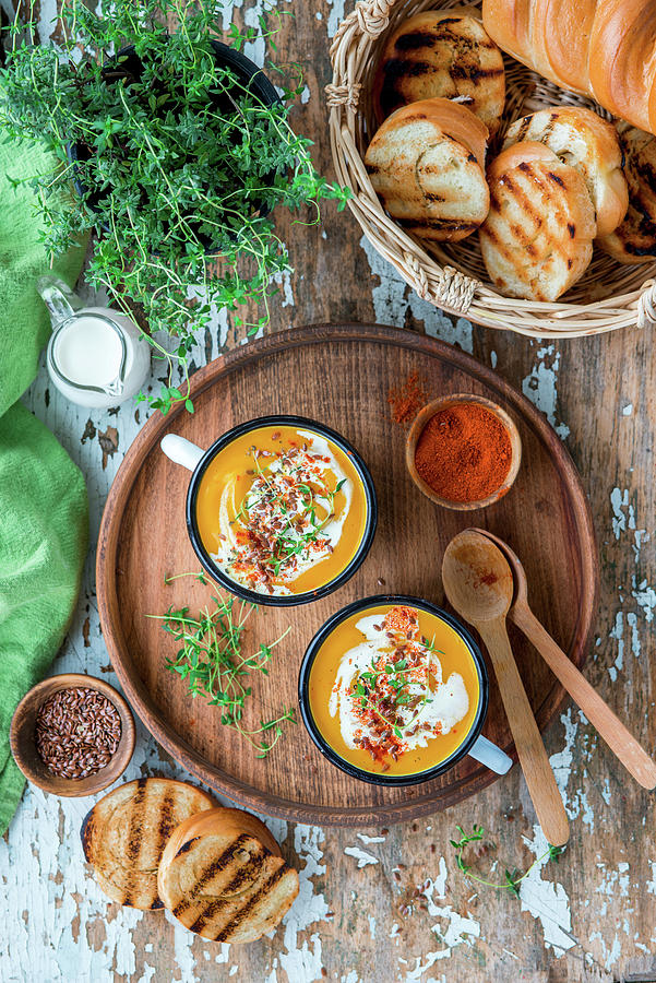 Pumpkin Soup With Thyme Photograph by Irina Meliukh