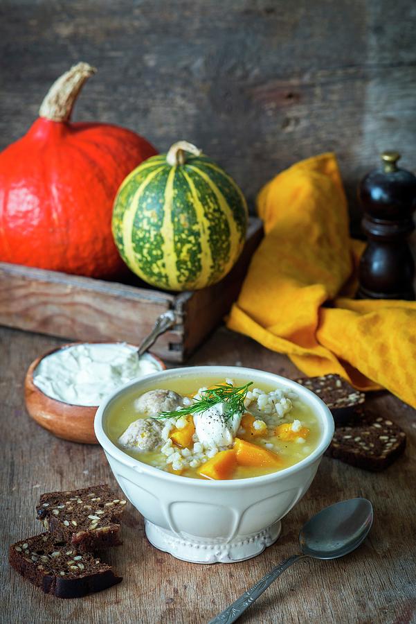 Pumpkin Soup With Turkey Meatballs And Pearl Barley Photograph by Irina Meliukh