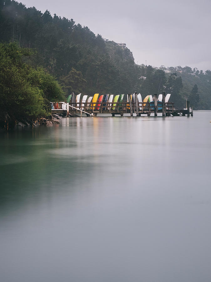 Boat Photograph - Purau Bay Colourful Boats On A Jetty On A Cloudy Day, Banks Peninsula by Cavan Images