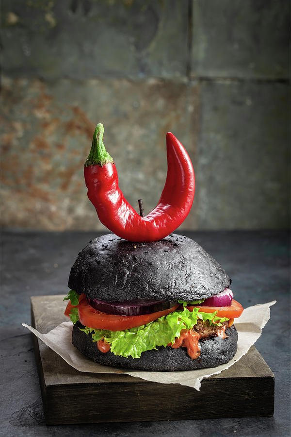 Purgatory Burger With Pepper In The Shape Of Horns Photograph by Andrey Maslakov