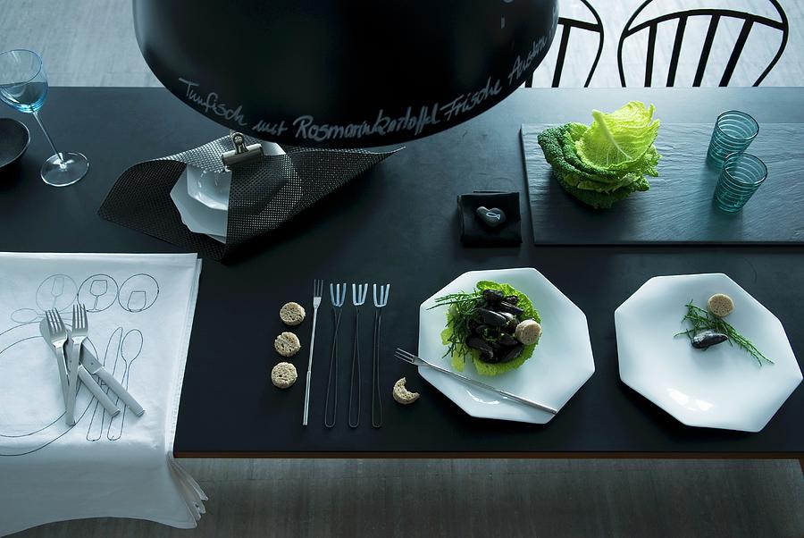 Purist Place Settings In Charcoal And White With Handwritten Menu On Dark Pendant Lampshade Photograph by Matteo Manduzio