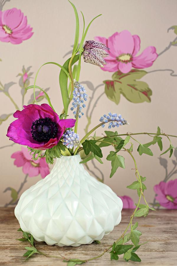 Purple Anemone, Snakes Head Fritillary And Grape Hyacinths In White Retro Vase Photograph by Cecilia Mller