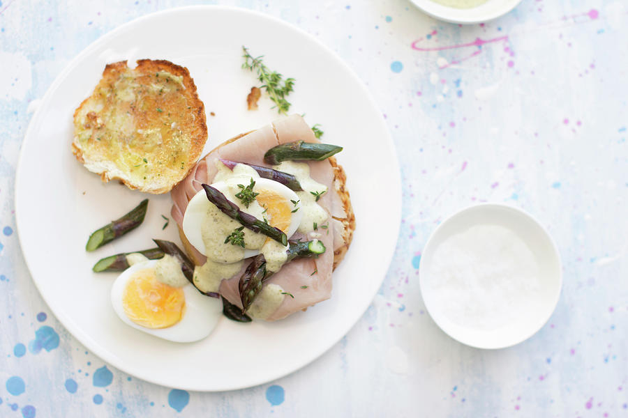 Purple Asparagus And Boiled Egg Breakfast Bun With Ham, Thyme And A Drizzle Of Hollandaise Photograph by Zappie