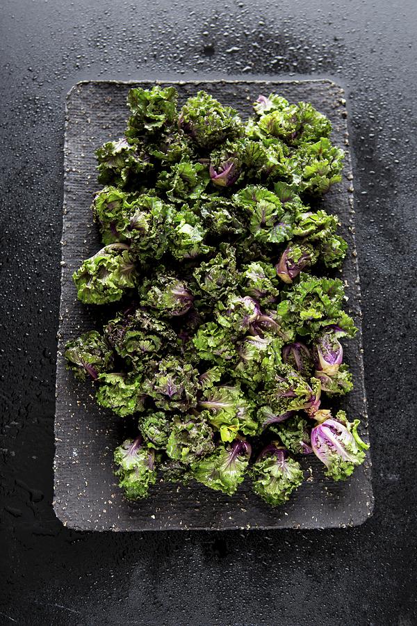 Purple Brussels Sprouts On A Tray Photograph by Aniko Takacs
