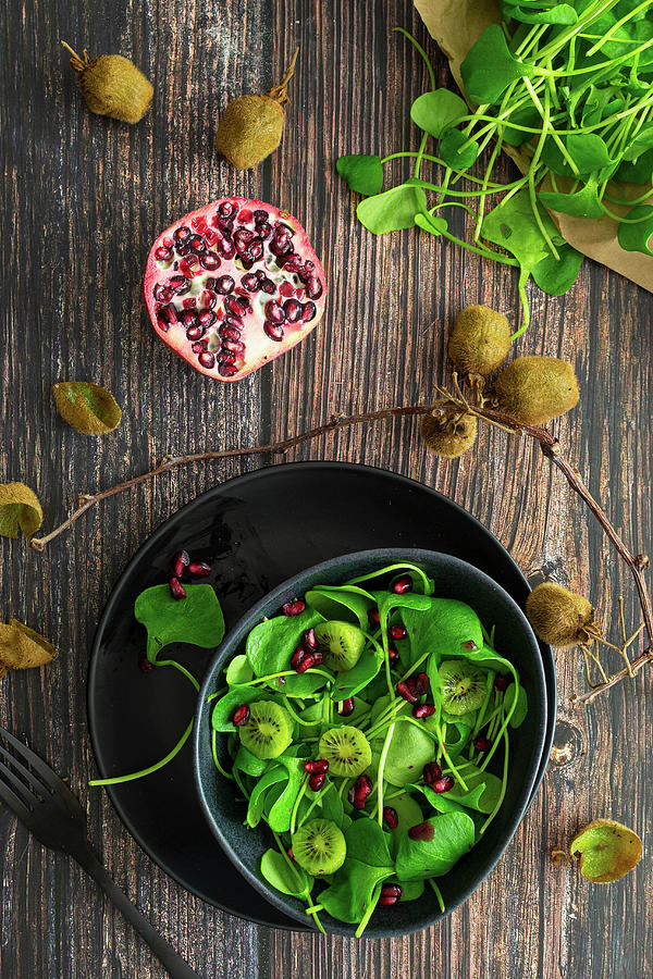 Purslane Salad With Kiwi And Pomegranate Seeds Photograph by Felix Kochbook