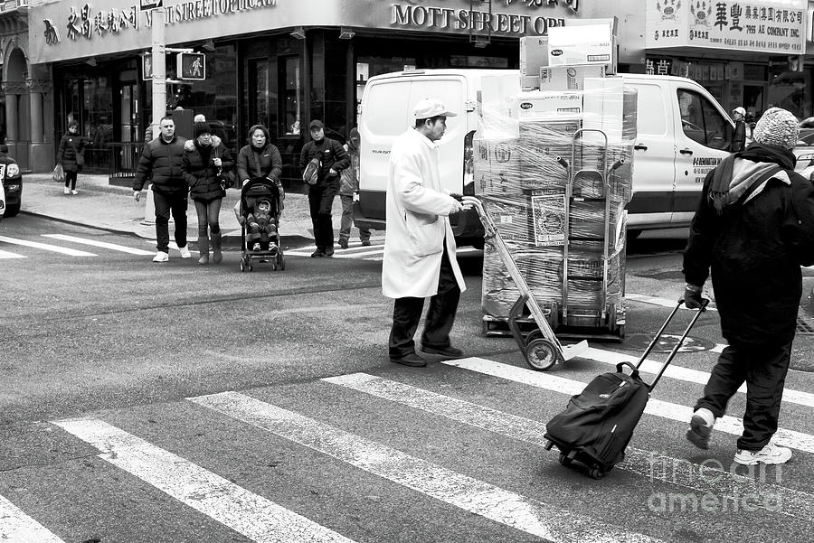 Pushing and Pulling in Chinatown New York City Photograph by John Rizzuto