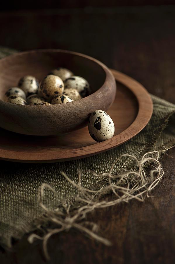 Quails Eggs In A Wooden Bowl Photograph by Magdalena Hendey