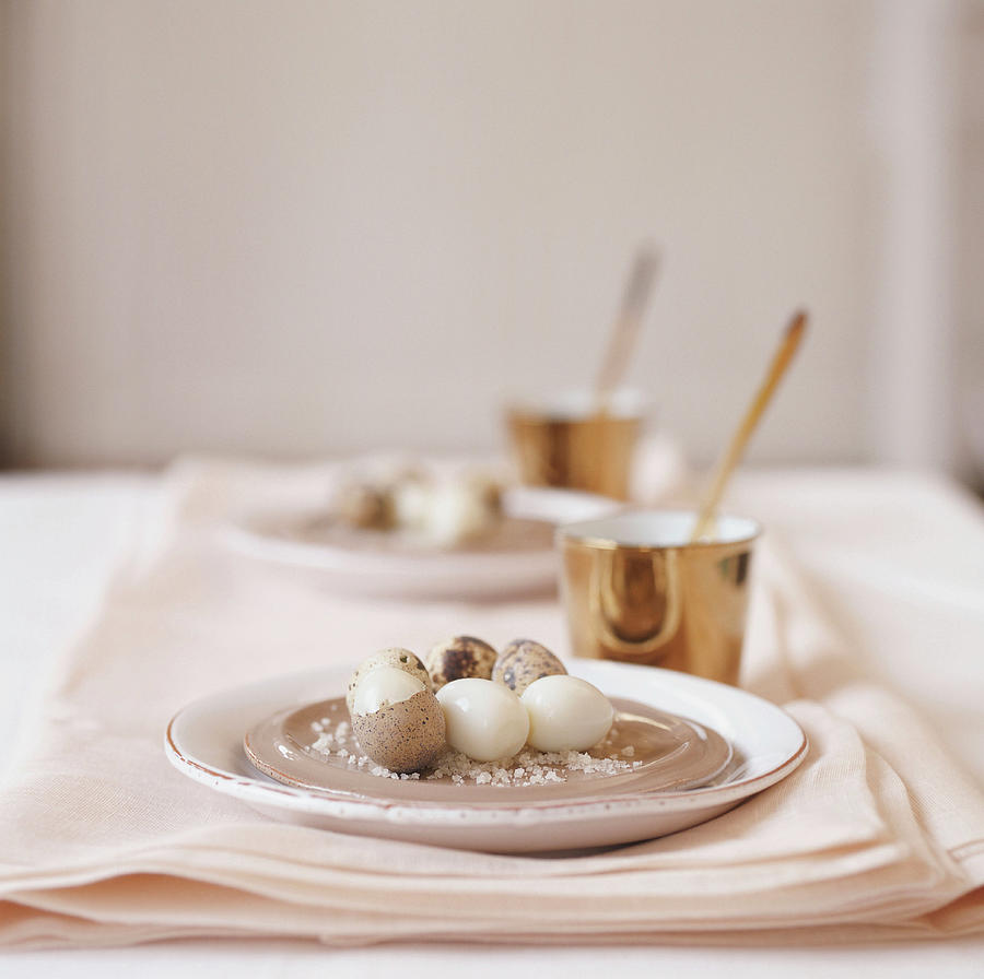 Quails Eggs On Plates Photograph by Michele Francken
