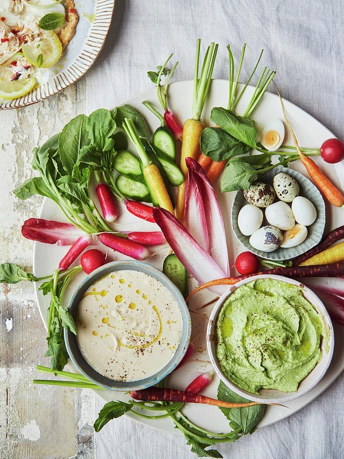 Quails Eggs, Radish, Chicory, Asparagus Crudite With Smoked Trout And Lemon Dip And Broad Bean And Pea Dip Photograph by Lukejalbert