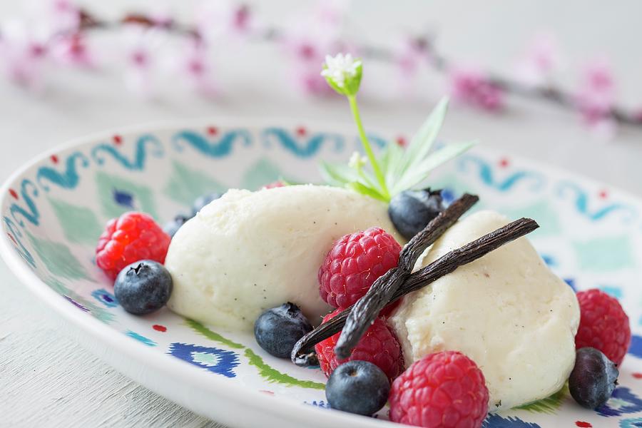 Quark Mousse With Berries And Vanilla Pods Photograph by Jan ...