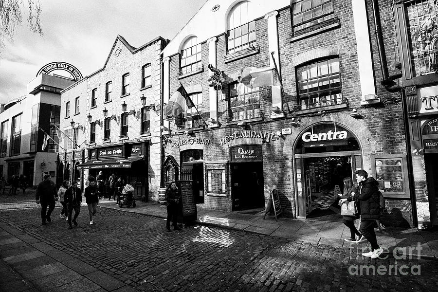 City Photograph - quays bar and restaurant in temple bar square Dublin Republic of Ireland Europe by Joe Fox