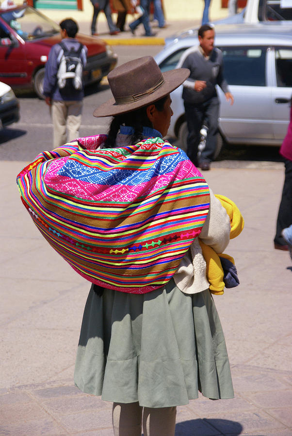 Quechua Indian woman with colorful backpack Photograph by Steve Estvanik