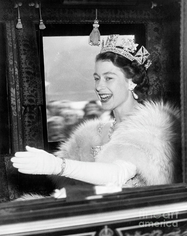 Queen Elizabeth II Waving From Coach Photograph by Bettmann