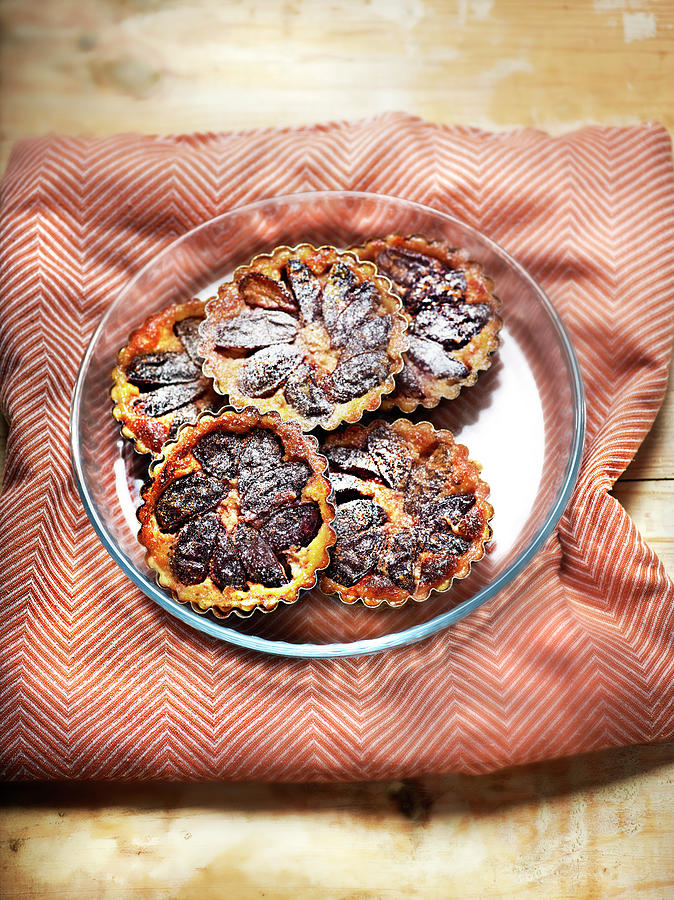 Quetsch Plum And Cinnamon Tartlets Photograph by Perrin