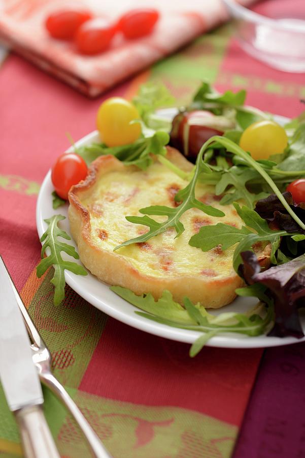 Quiche Lorraine With Cherry Tomatoes And Rocket Photograph by Caste, Alain