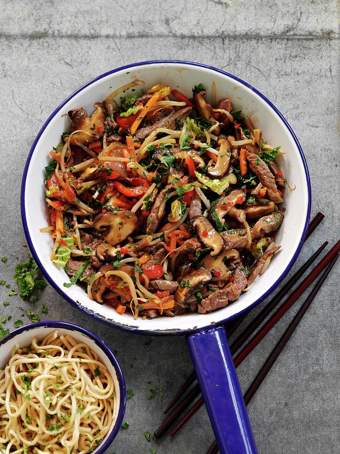 Quick And Easy Beef Stir Fry With Vegetables Served With A Side Dish Of Noodles Photograph by Gareth Morgans