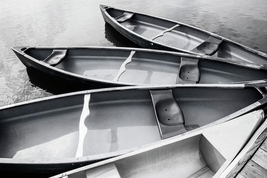Quiet Waters Canoes Photograph by Karen Smale
