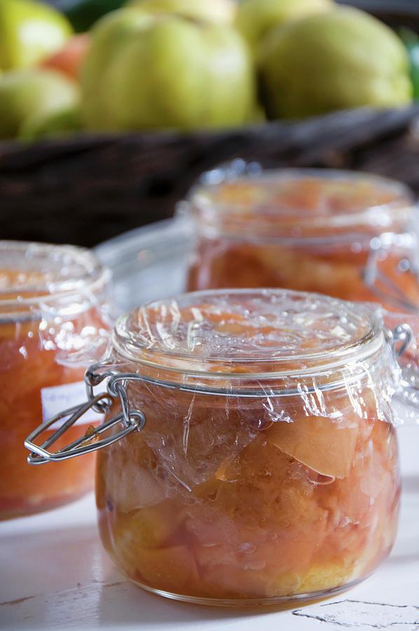 Quince Compote With Apple And Orange Photograph by Nele Siebel