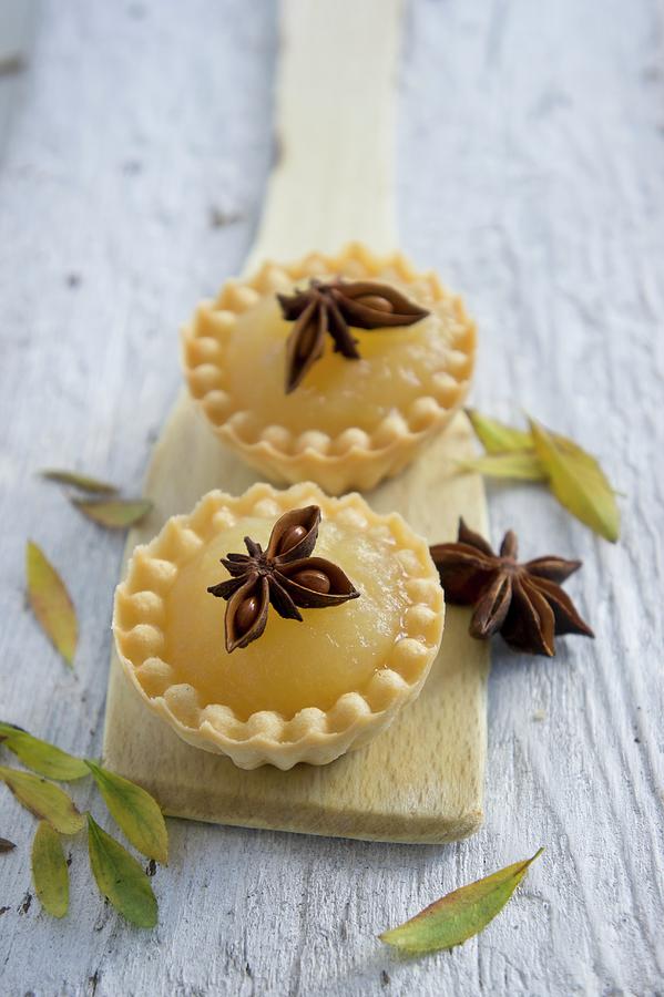 Quince Tartlets With Star Anise Photograph by Martina Schindler