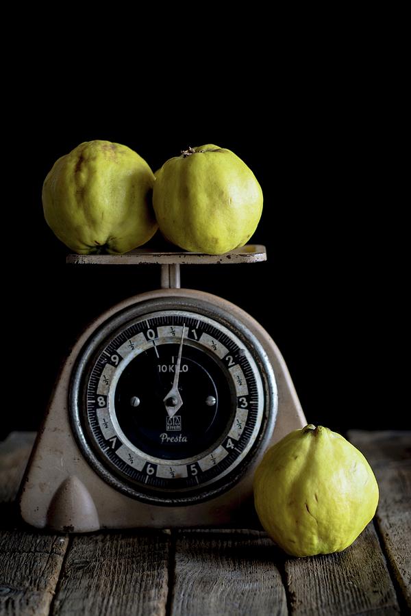 Quinces On A Pair Of Retro Scales Photograph by Adriana Baran