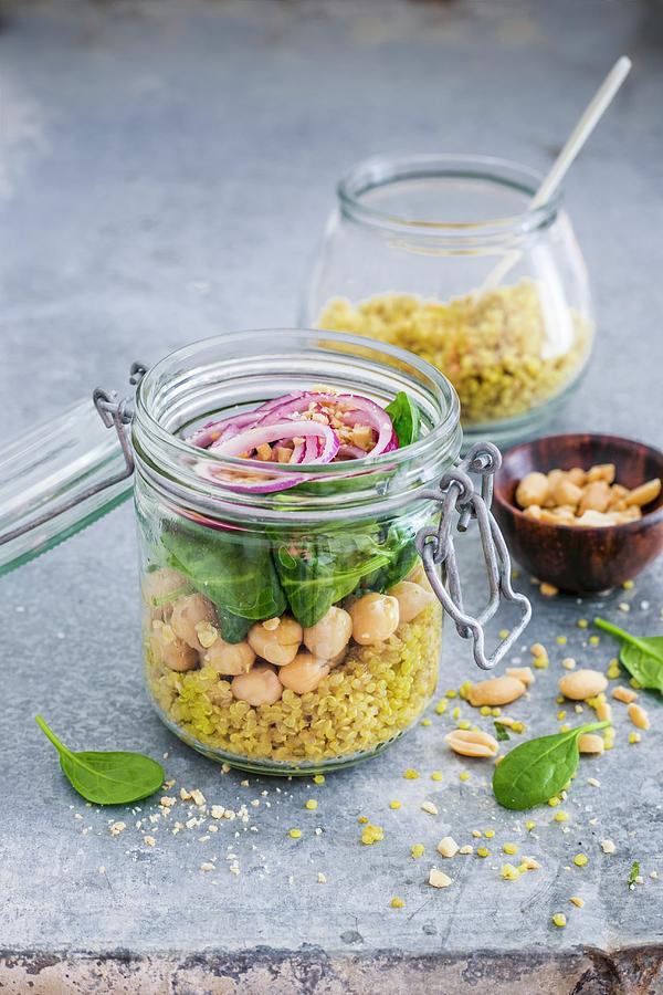 Quinoa Curry With Baby Leaf Spinach, Chickpeas And Red Onion In A Glass Jar Photograph by Maricruz Avalos Flores
