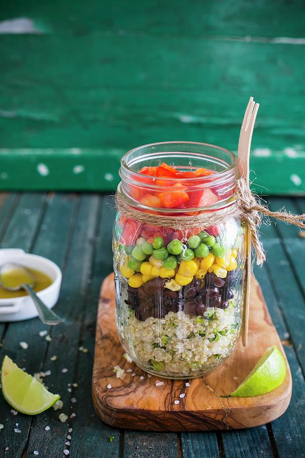 Quinoa Salad With Vegetables, Coriander And Lime Vinaigrette In A Glass Jar Photograph by Maricruz Avalos Flores