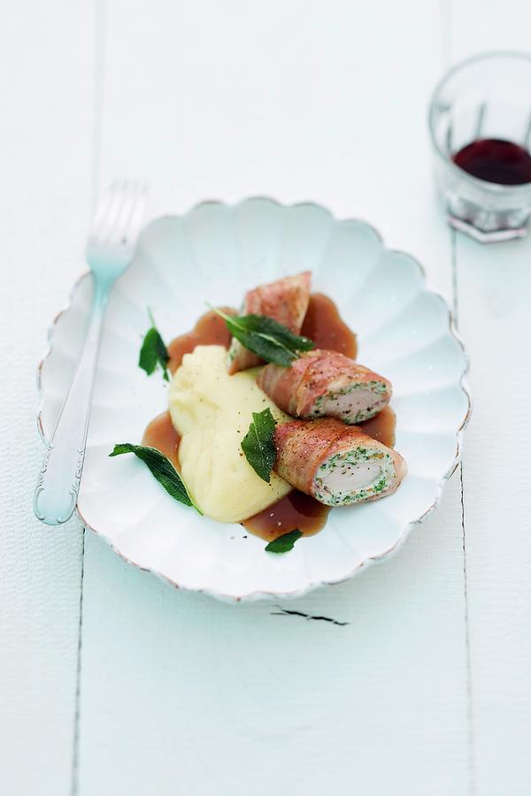 Rabbit Fillet Wrapped In Bacon With Mashed Potatoes Photograph by Michael Wissing