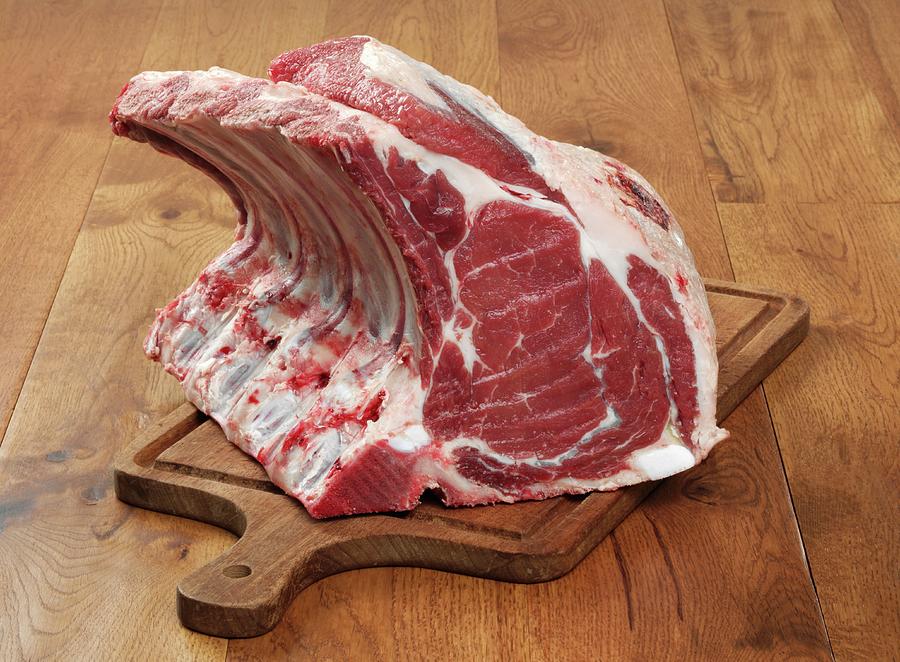 Rack Of Beef Ribs On A Chopping Board Photograph by Stuart Macgregor ...