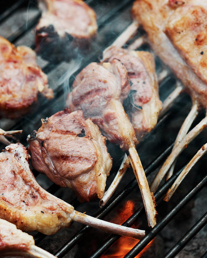 Racks Of Lamb On A Barbecue Photograph by Miha Lorencak
